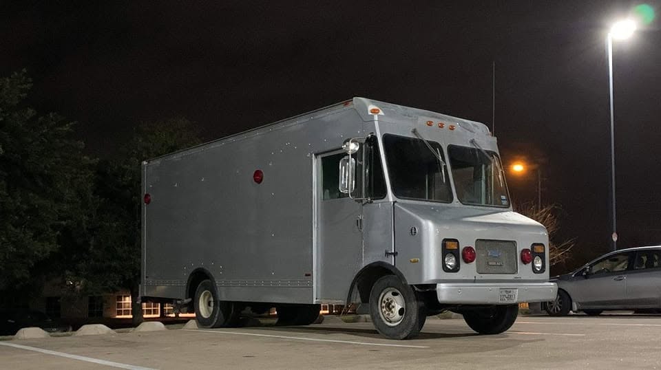 Advanced Auto Repair service unit at night